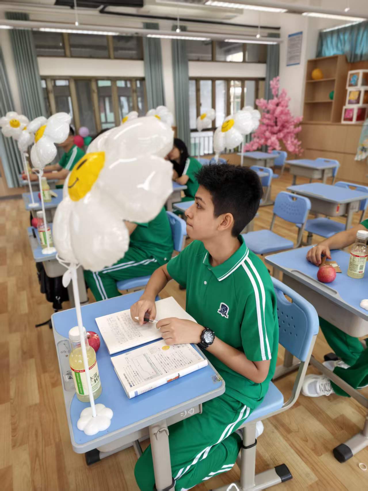 A student in class at Xingzhi School
